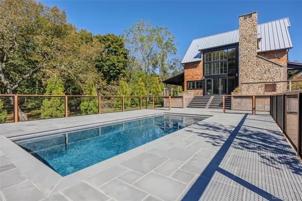 swimming pool view with a outdoor space
