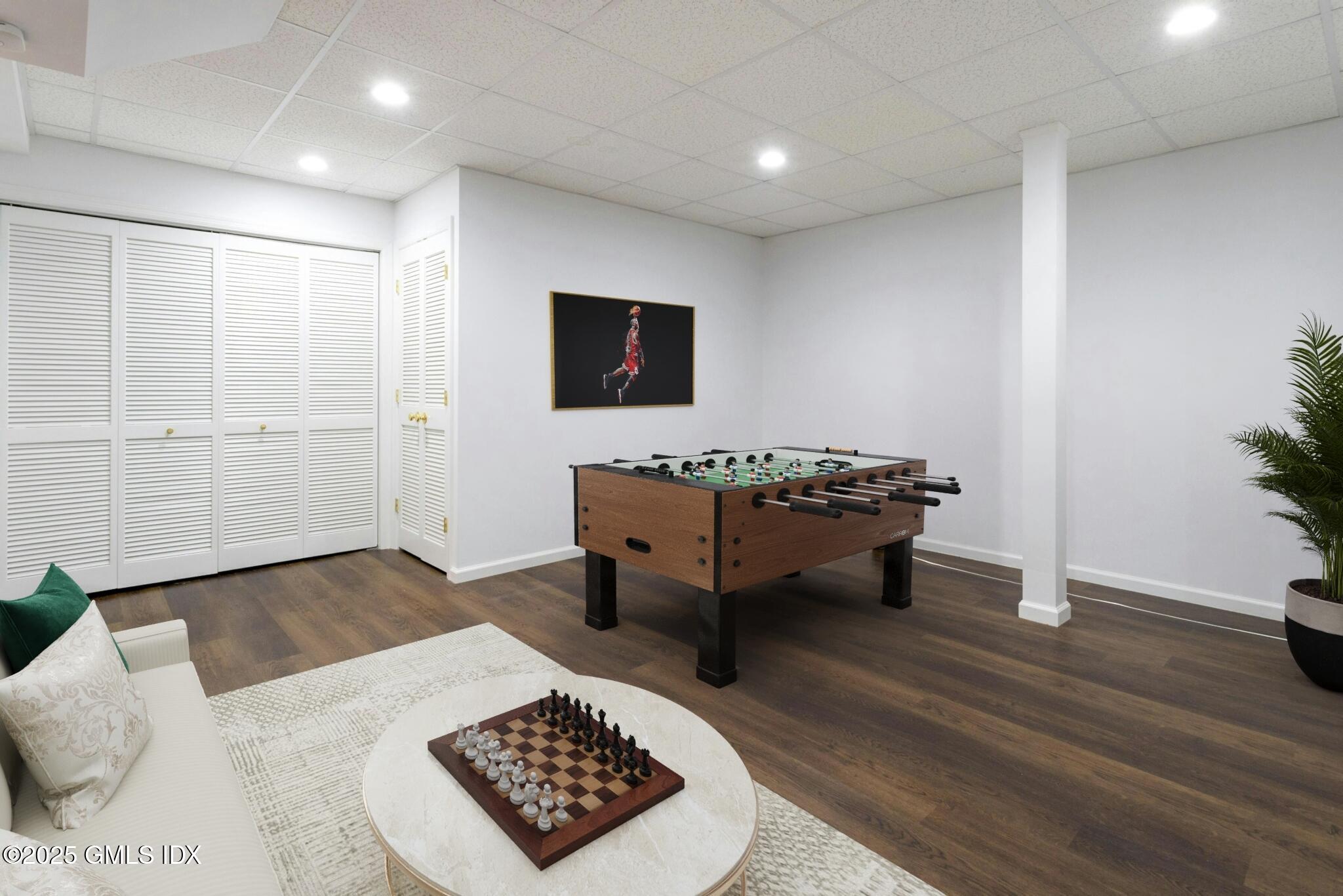 50 Church Street, Unit 5 Greenwich, CT 06830 - Photo 11 of 17 a bedroom with furniture and a rug