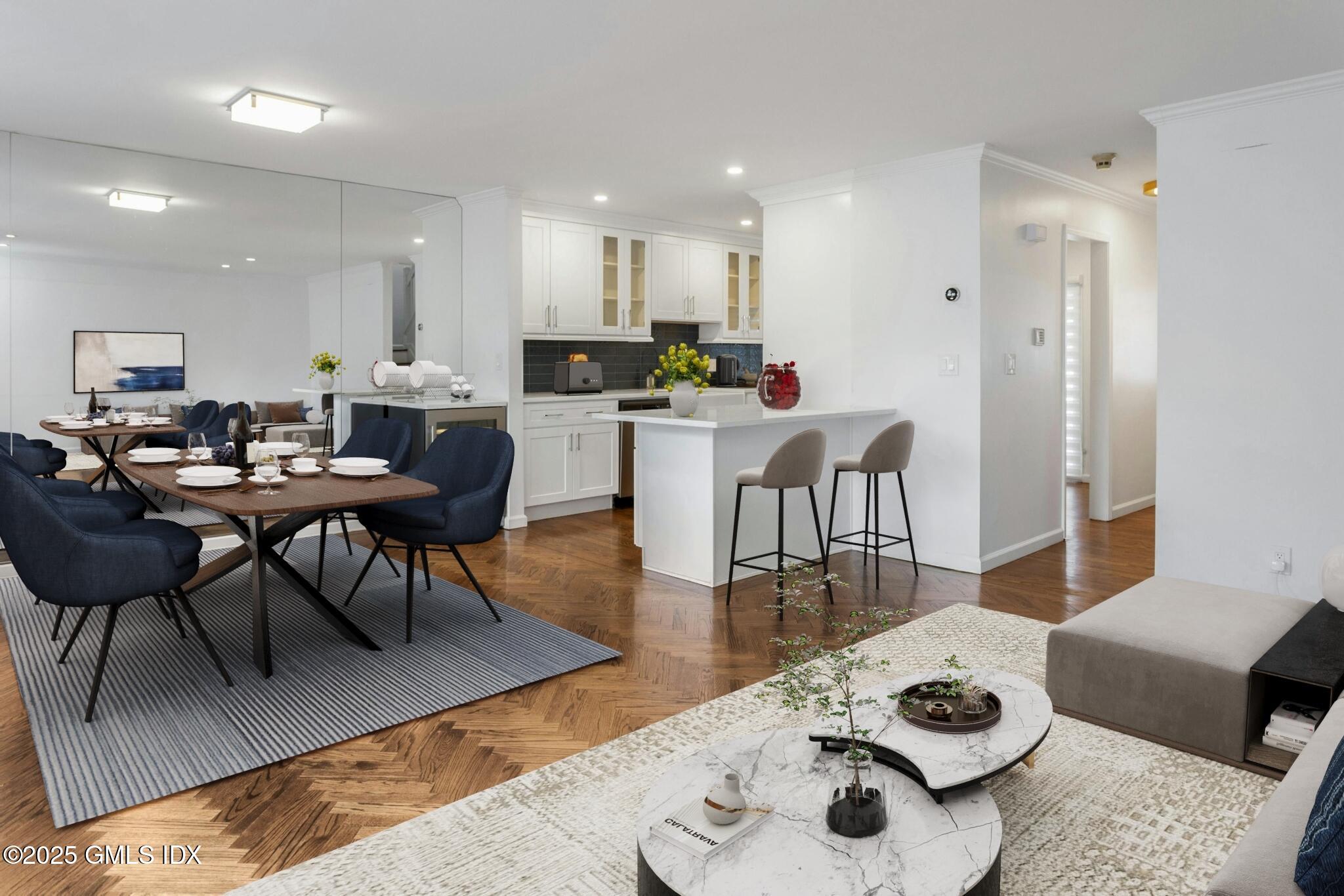 50 Church Street, Unit 5 Greenwich, CT 06830 - Photo 7 of 17 a living room with furniture and wooden floor