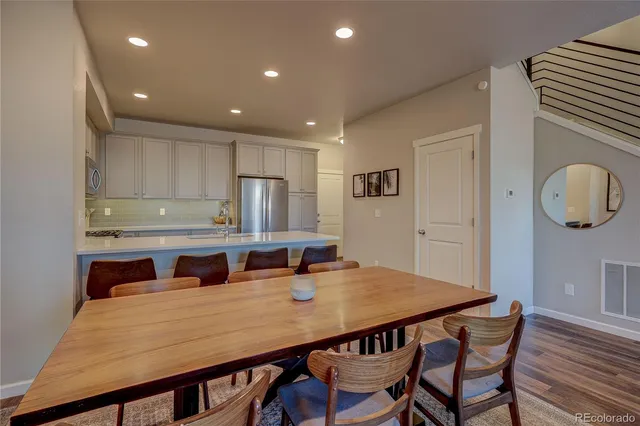 a view of kitchen and dining area with furniture