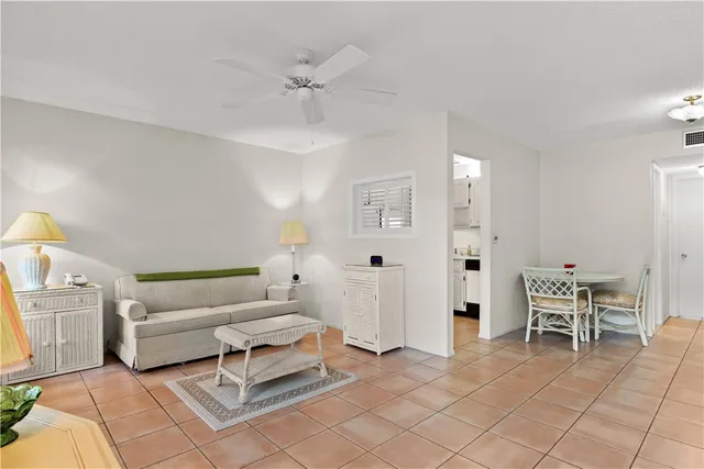 a bathroom with a tub shower and mirror