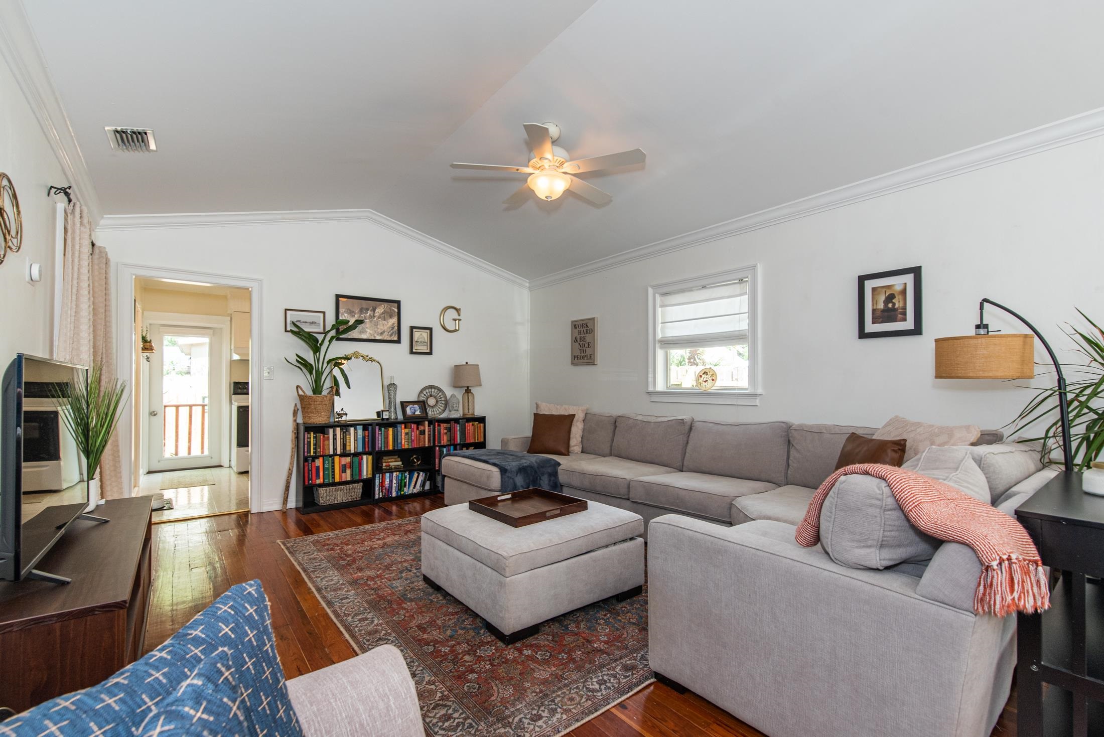 132 Oneida Street St. Augustine, FL 32084 - Photo 11 of 36 a living room with furniture a ceiling fan and a window