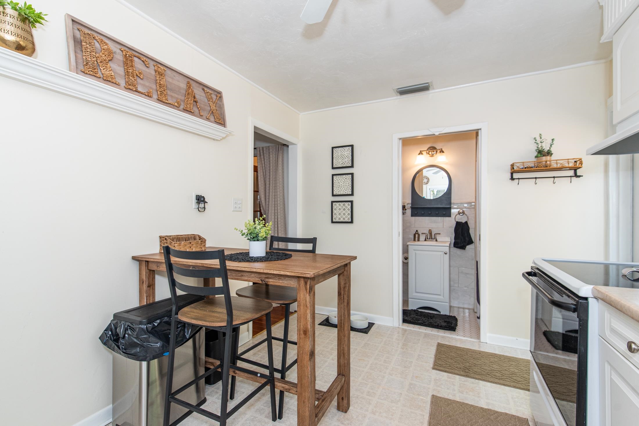 132 Oneida Street St. Augustine, FL 32084 - Photo 23 of 36 a view of a dining room with furniture and a window