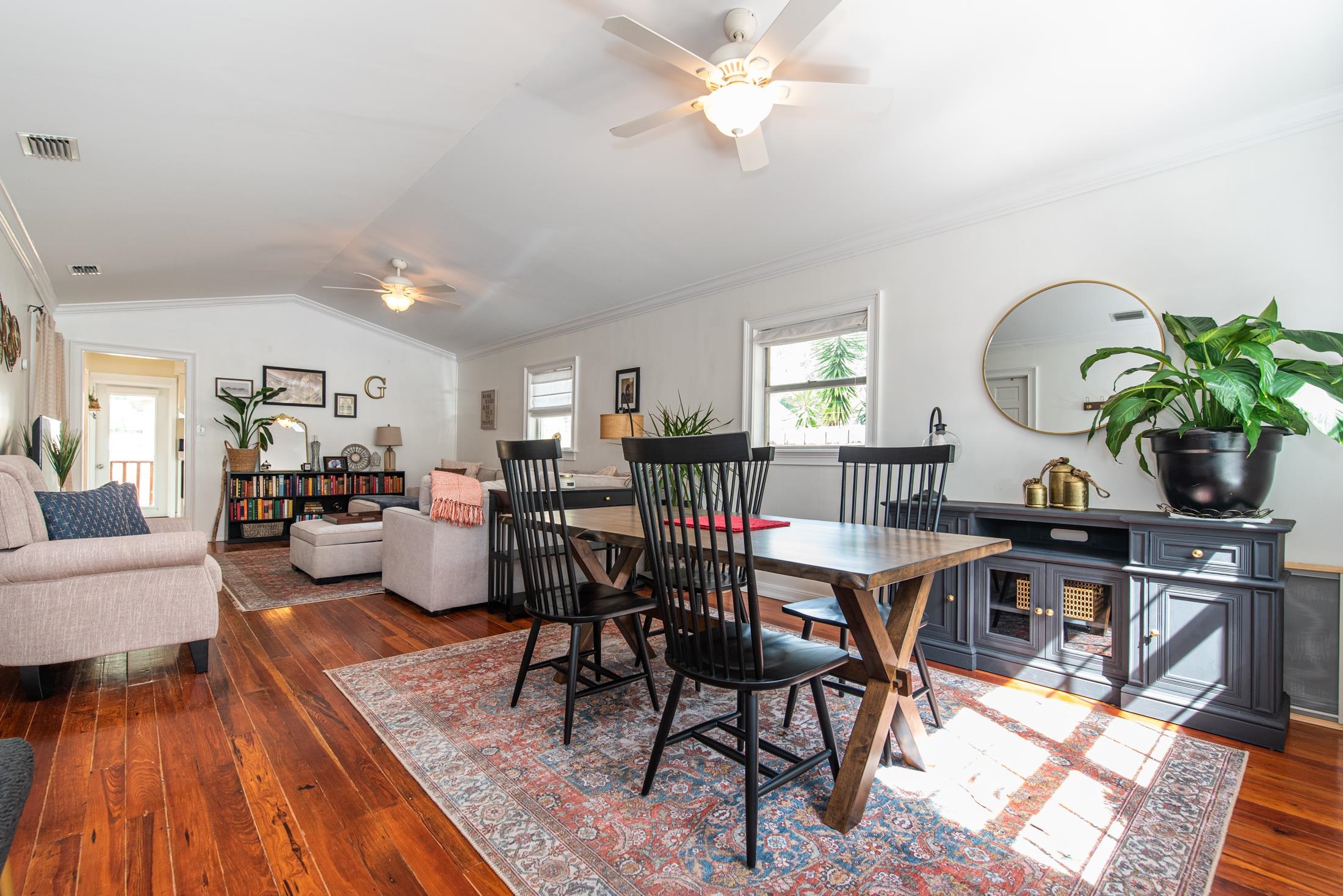 132 Oneida Street St. Augustine, FL 32084 - Photo 3 of 36 a view of a dining room with furniture window and wooden floor
