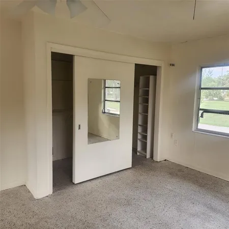 an empty room with windows