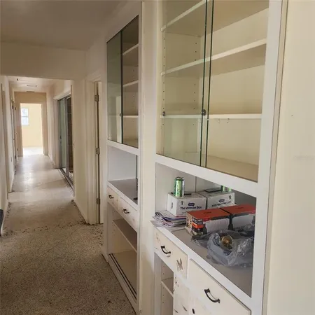 a view of cabinets and window