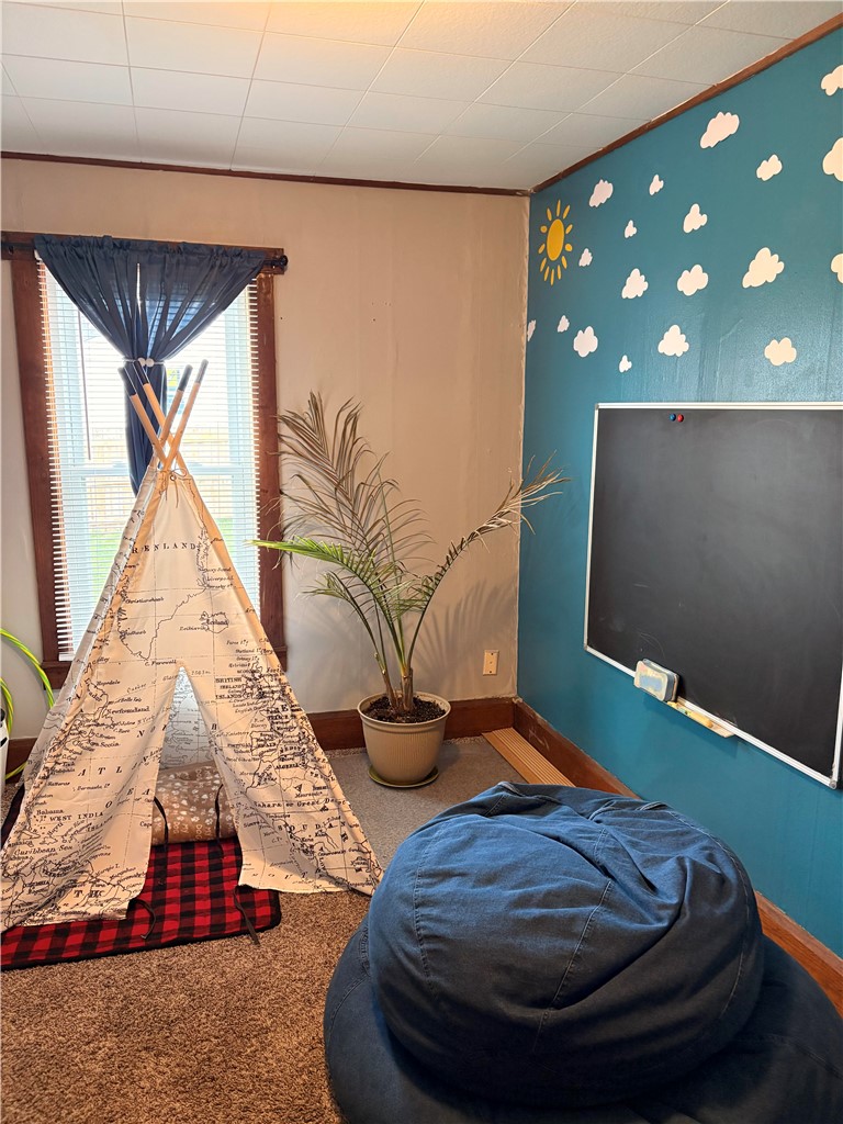 321 Liberty Street Eaton, OH 45320 - Photo 26 of 34 This versatile room offers a comfortable setting for various activities.