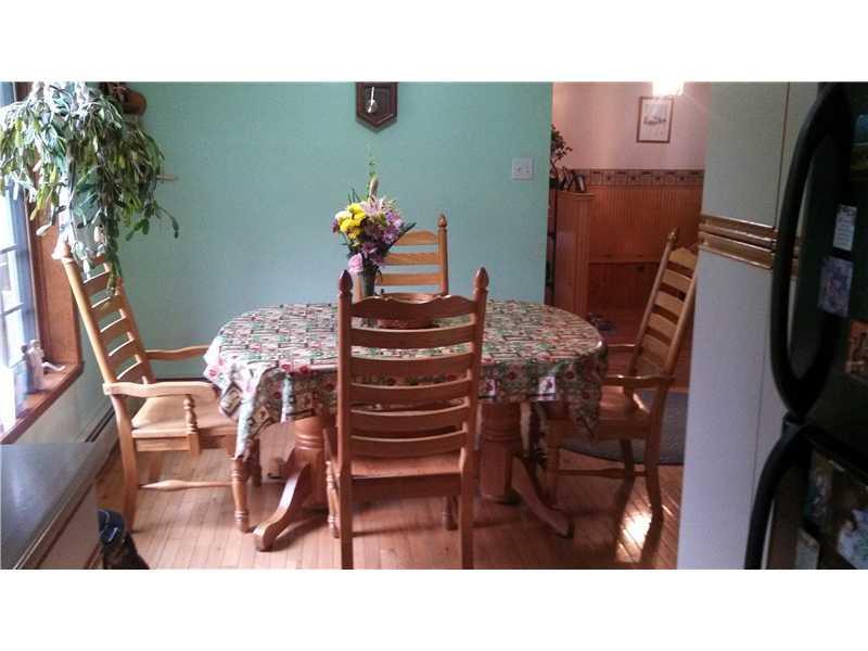 13 Attean Road Jackman, ME 04945 - Photo 5 of 11 Dining Room. notice the hardwood floors