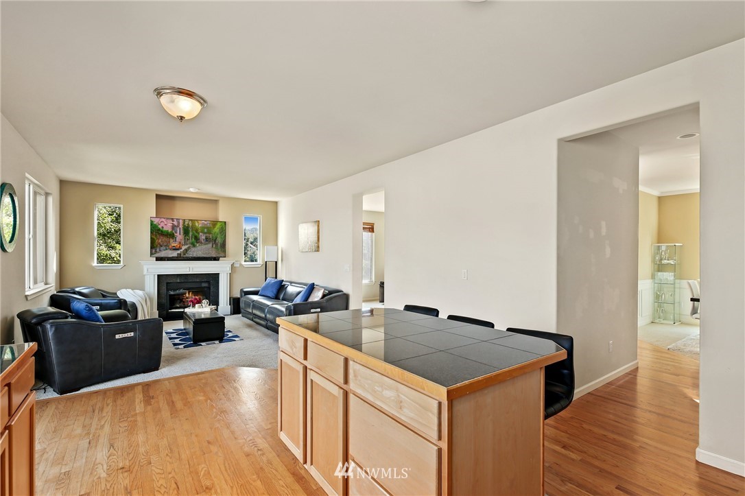 322 South 21st Street Renton, WA 98055 - Photo 11 of 29 a view of living room with furniture and fireplace