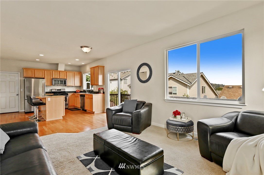 322 South 21st Street Renton, WA 98055 - Photo 13 of 29 a living room with furniture and kitchen view