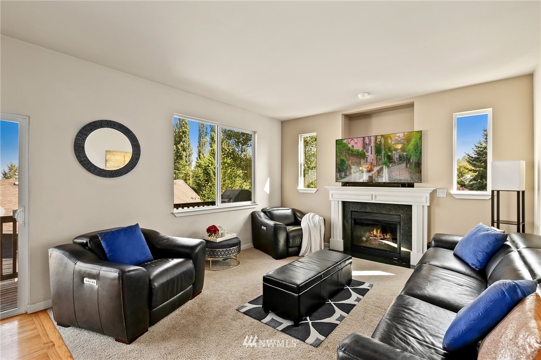 322 South 21st Street Renton, WA 98055 - Photo 14 of 29 a living room with furniture and a fireplace