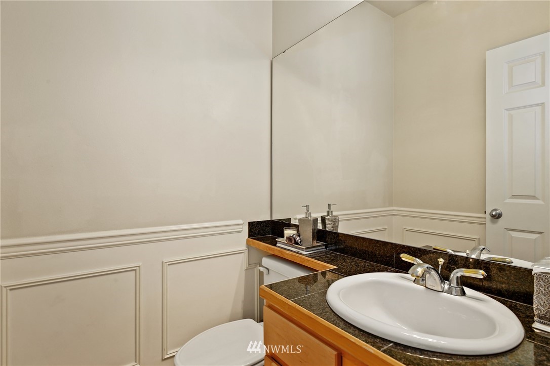 322 South 21st Street Renton, WA 98055 - Photo 15 of 29 a bathroom with a sink and a toilet