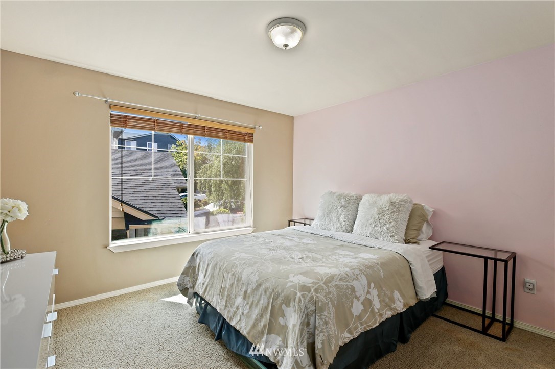 322 South 21st Street Renton, WA 98055 - Photo 20 of 29 a bed sitting in a bedroom next to a window