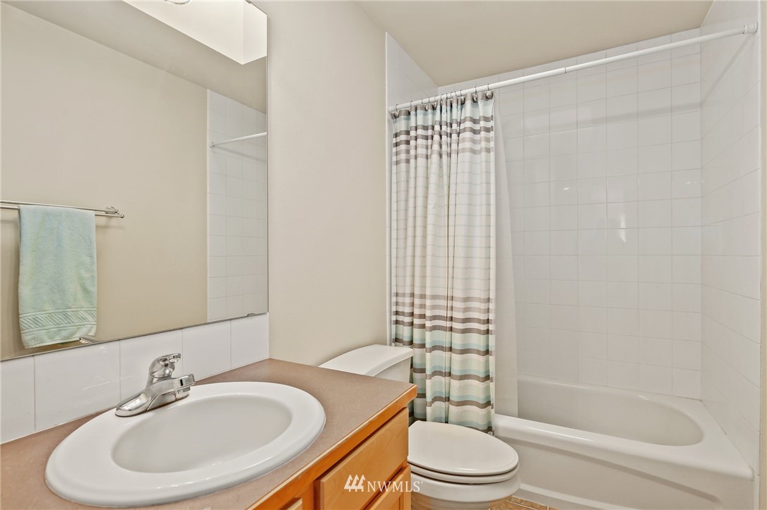 322 South 21st Street Renton, WA 98055 - Photo 22 of 29 a bathroom with a sink toilet and shower