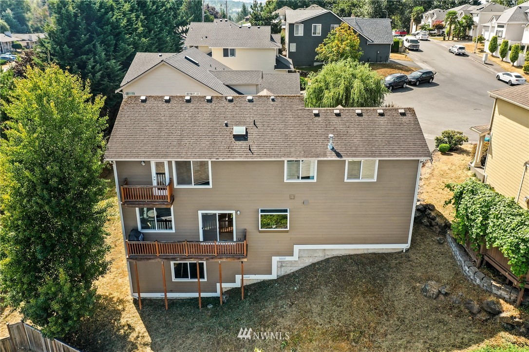 322 South 21st Street Renton, WA 98055 - Photo 28 of 29 an aerial view of a house with a yard
