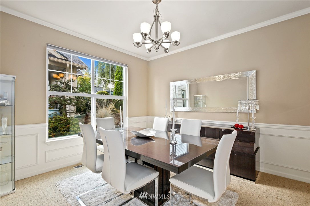 322 South 21st Street Renton, WA 98055 - Photo 4 of 29 a view of a dining room with furniture window and outside view