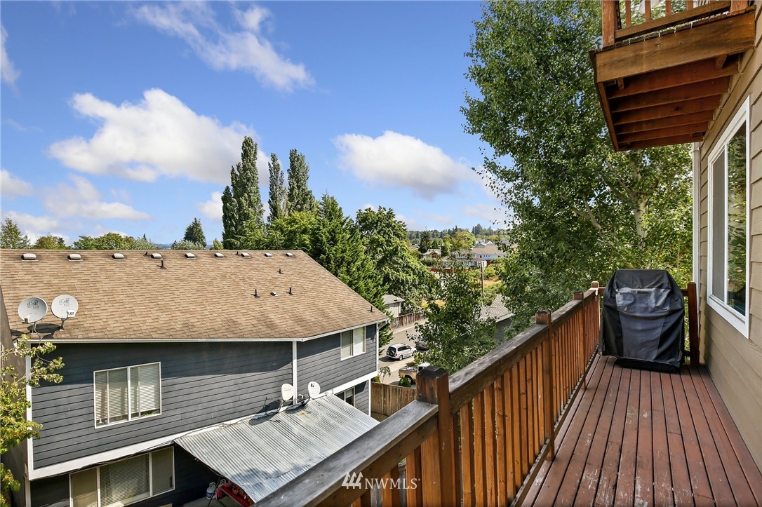 322 South 21st Street Renton, WA 98055 - Photo 9 of 29 a roof deck with table and chairs