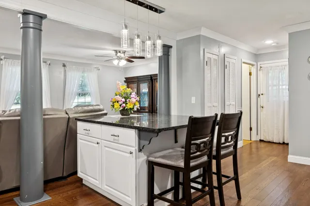 a bedroom with a bed and cabinets