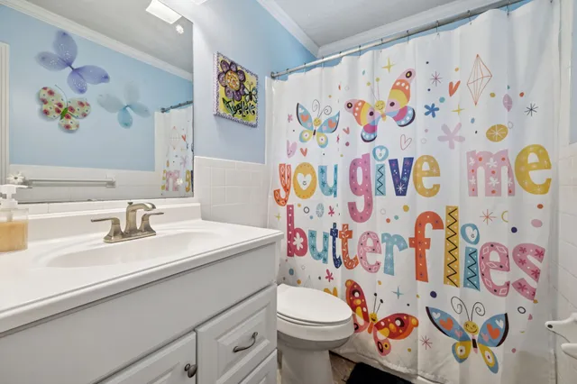 a view of livingroom with furniture and a flat screen tv