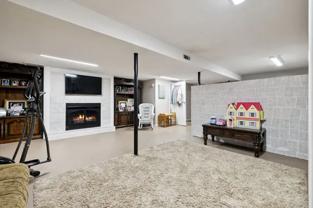 a view of a house with a yard and garage