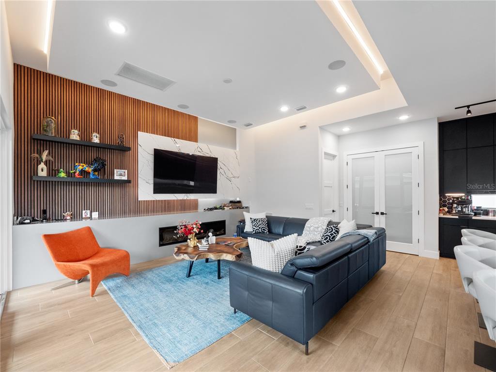 239 Hampton Loop Davenport, FL 33837 - Photo 13 of 43 a living room with furniture and a flat screen tv