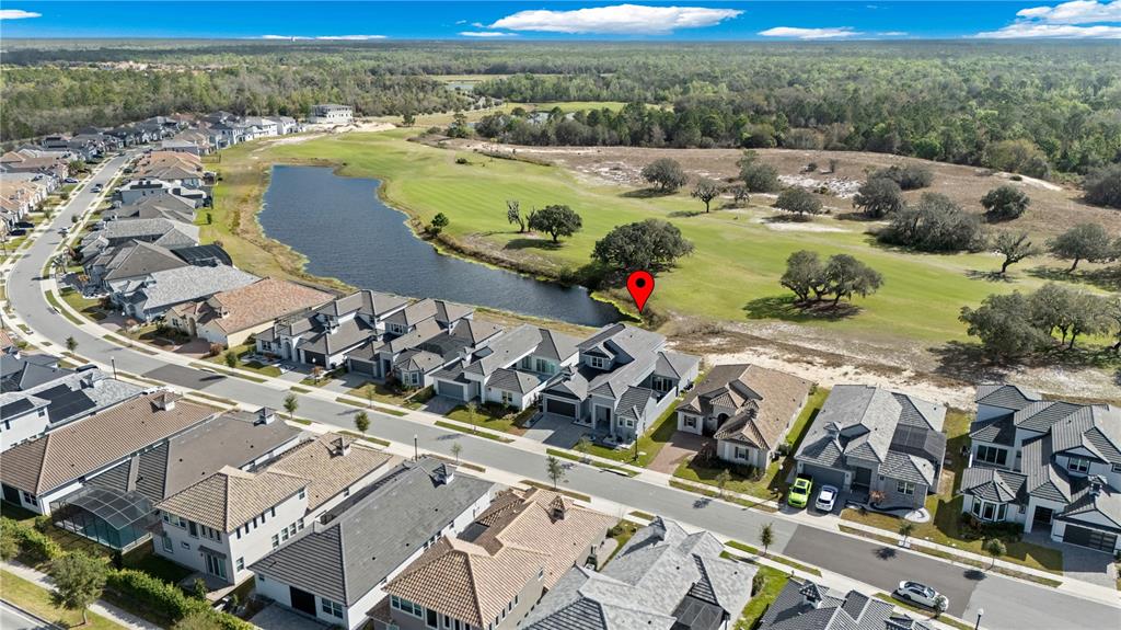 239 Hampton Loop Davenport, FL 33837 - Photo 2 of 43 an aerial view of a house with a ocean view