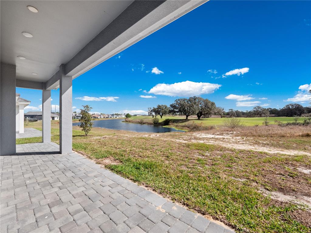 239 Hampton Loop Davenport, FL 33837 - Photo 31 of 43 a view of an ocean and a beach
