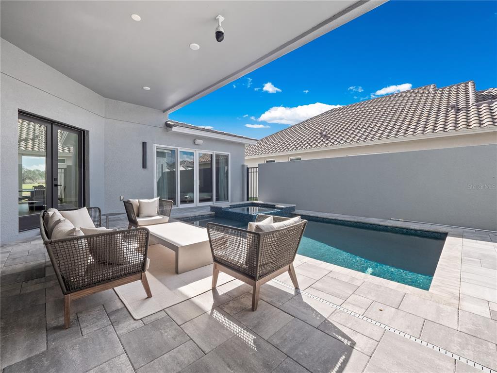 239 Hampton Loop Davenport, FL 33837 - Photo 5 of 43 a dining room with a table and chairs