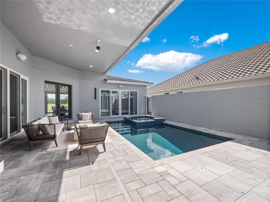 239 Hampton Loop Davenport, FL 33837 - Photo 7 of 43 a view of a livingroom with furniture and window