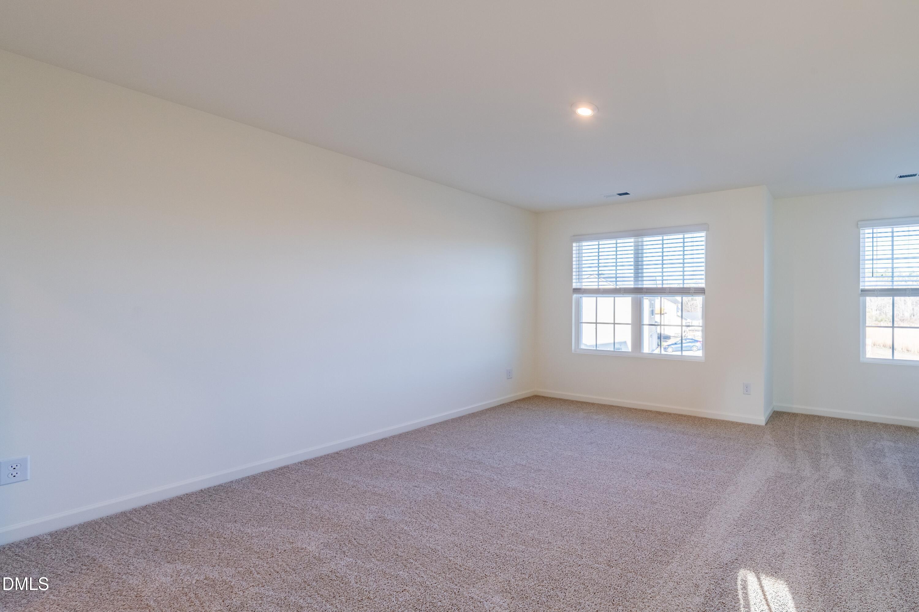 55 Fern Ridge Drive, Unit 1 Cameron, NC 28326 - Photo 18 of 42 an empty room with a window
