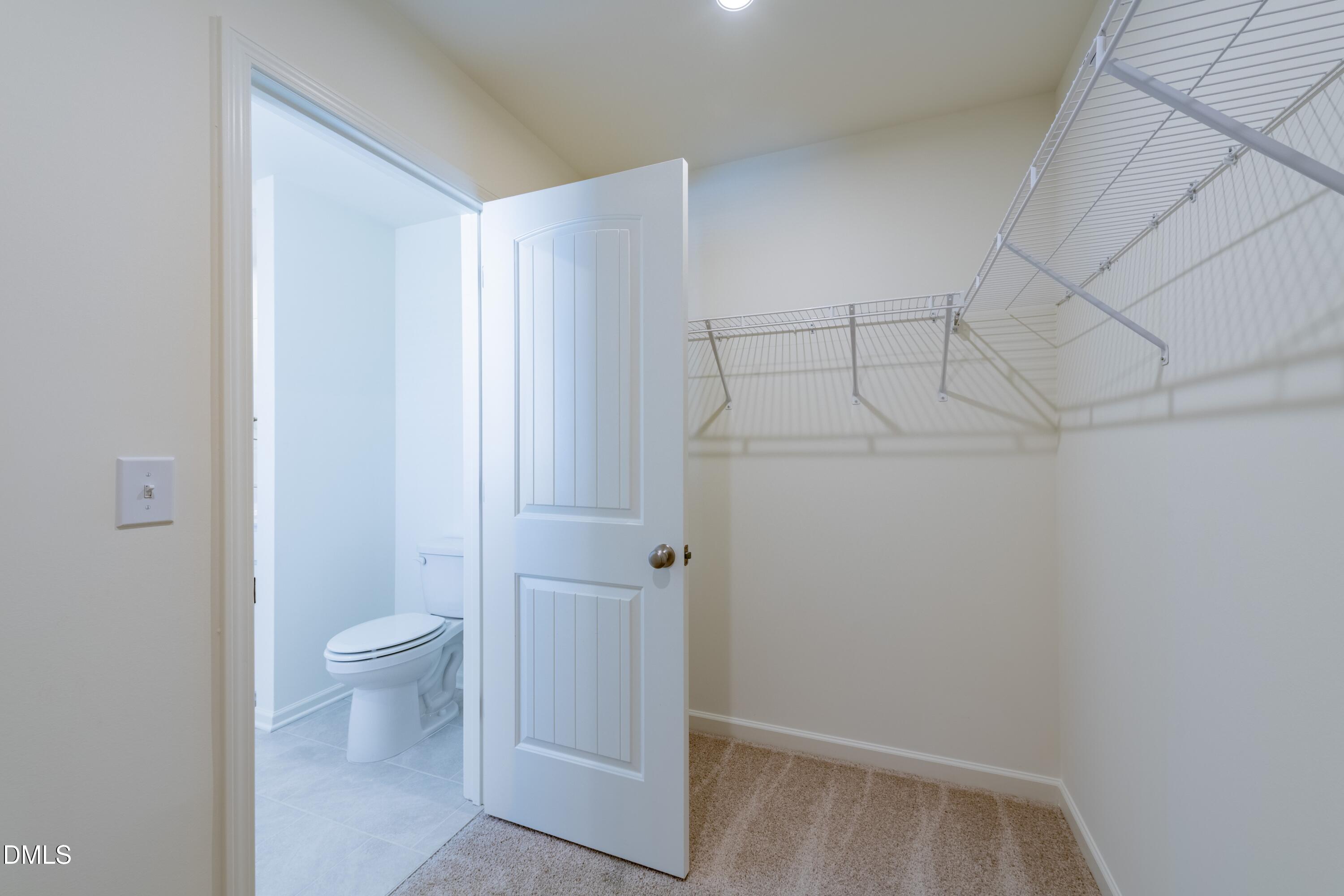 55 Fern Ridge Drive, Unit 1 Cameron, NC 28326 - Photo 24 of 42 a view of bathroom with a sink