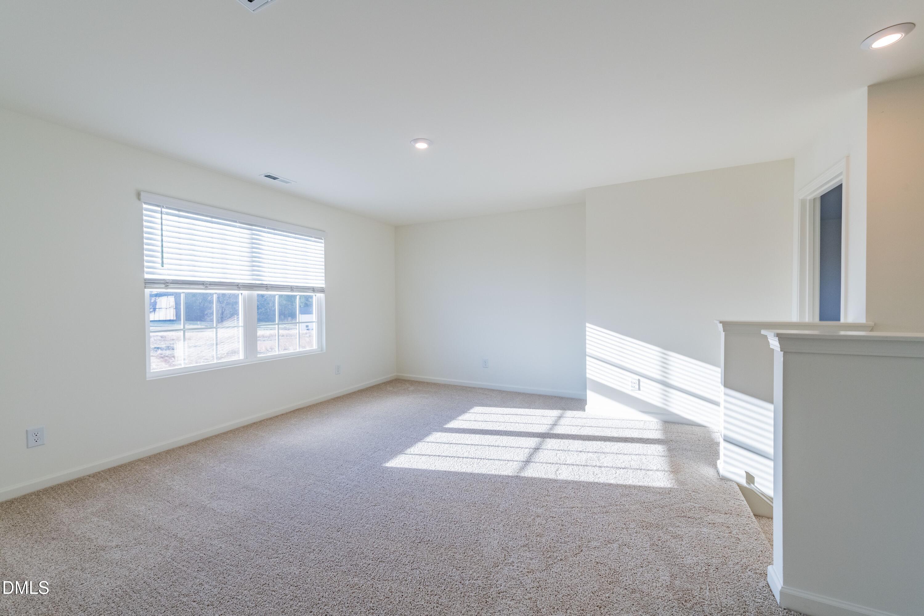 55 Fern Ridge Drive, Unit 1 Cameron, NC 28326 - Photo 42 of 42 a view of an empty room with a window