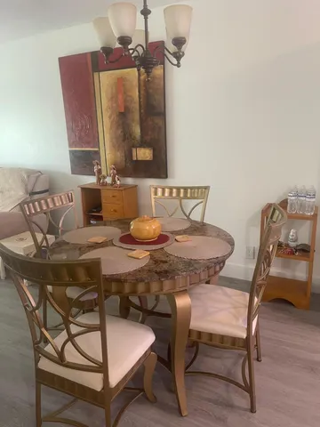 a view of a dining room with furniture