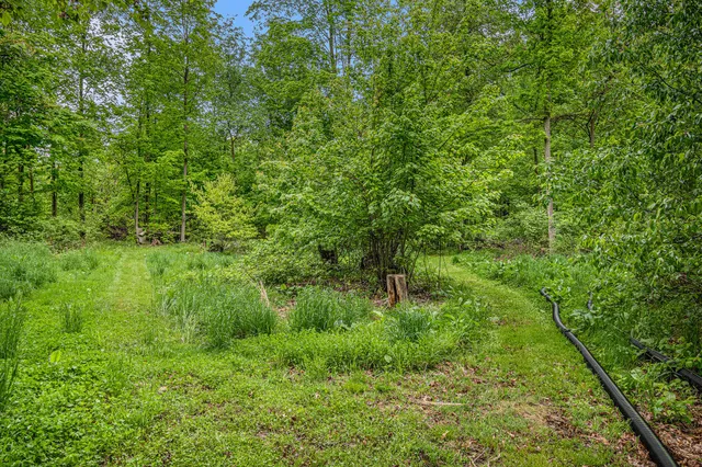 $489,000 | 13085 East Englewright Drive, Sand Lake, MI 49343