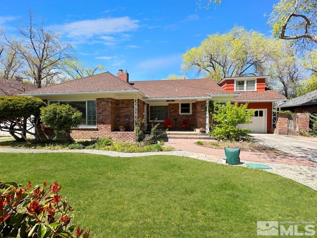 987 Mt Rose Street Reno, NV 89509 - Photo 1 of 34 a view of a house with a swimming pool