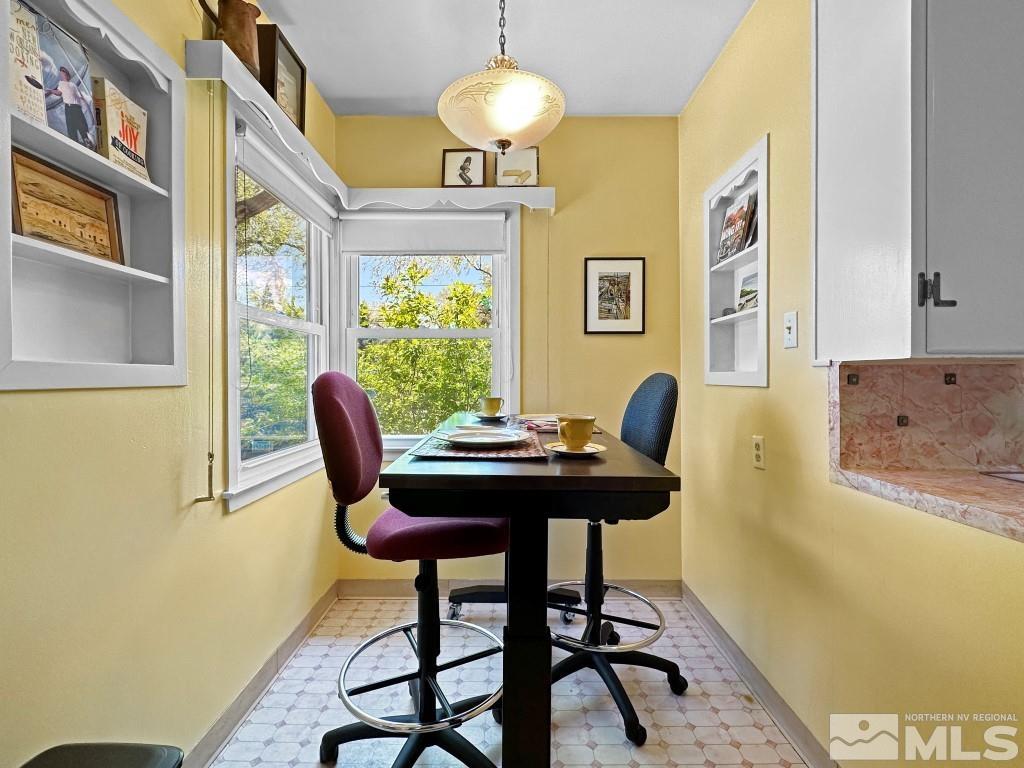 987 Mt Rose Street Reno, NV 89509 - Photo 12 of 34 a view of a dining room with furniture and a chandelier