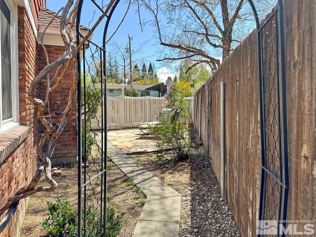987 Mt Rose Street Reno, NV 89509 - Photo 31 of 34 a view of a pathway of a house with a yard
