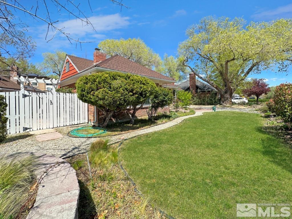 987 Mt Rose Street Reno, NV 89509 - Photo 34 of 34 a front view of a house with a yard