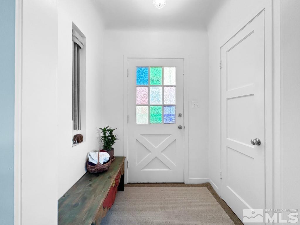 987 Mt Rose Street Reno, NV 89509 - Photo 6 of 34 a view of an entryway with wooden floor