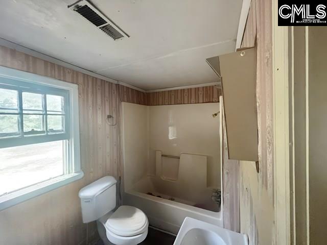 5545 Pisgah Road Rembert, SC 29128 - Photo 7 of 26 a bathroom with a toilet and a shower