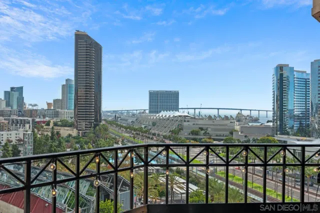 a view of a balcony with city view
