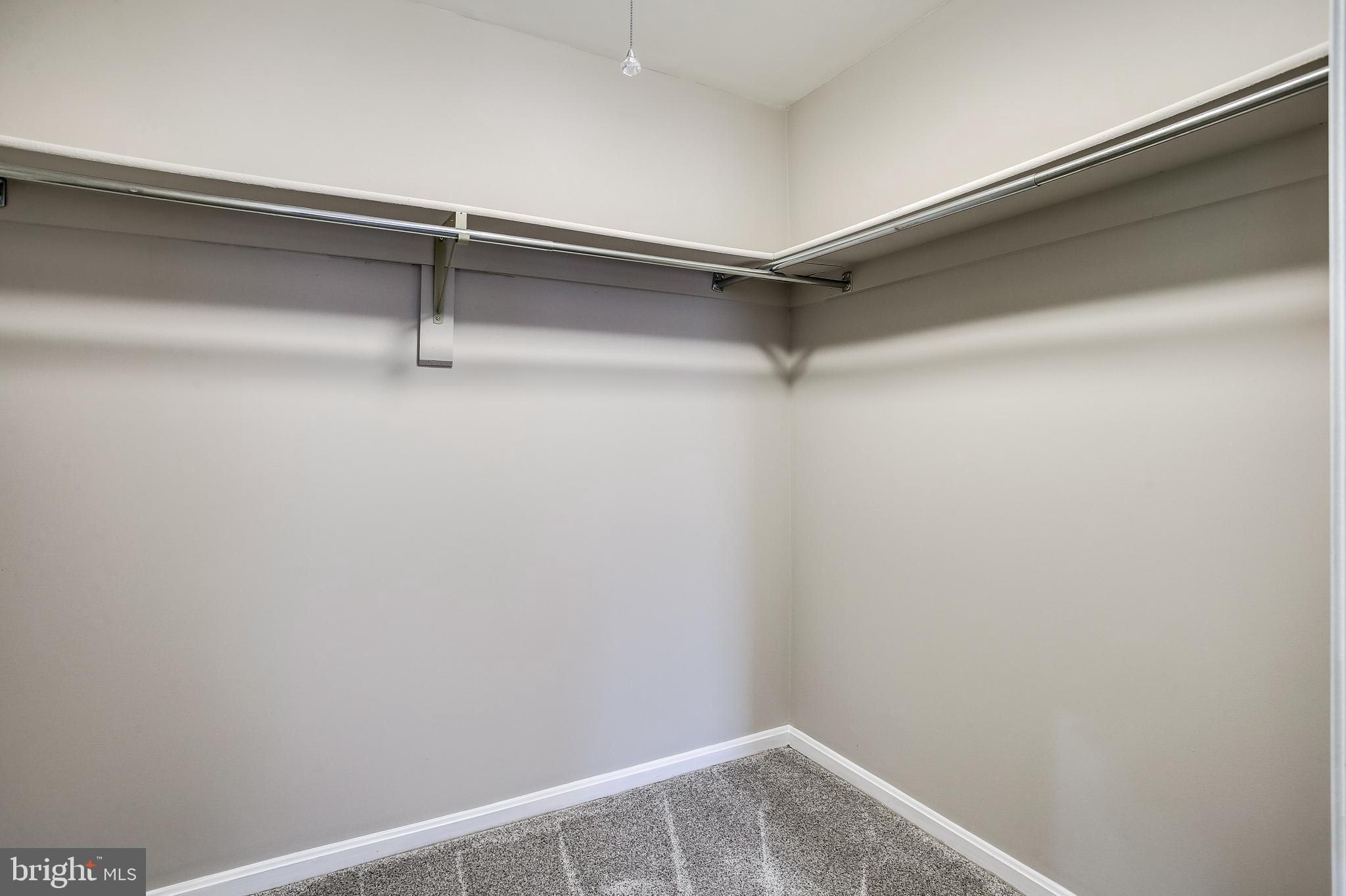 14212 Twig Road Silver Spring, MD 20905 - Photo 19 of 36 Primary Bedroom Walk-in Closet
