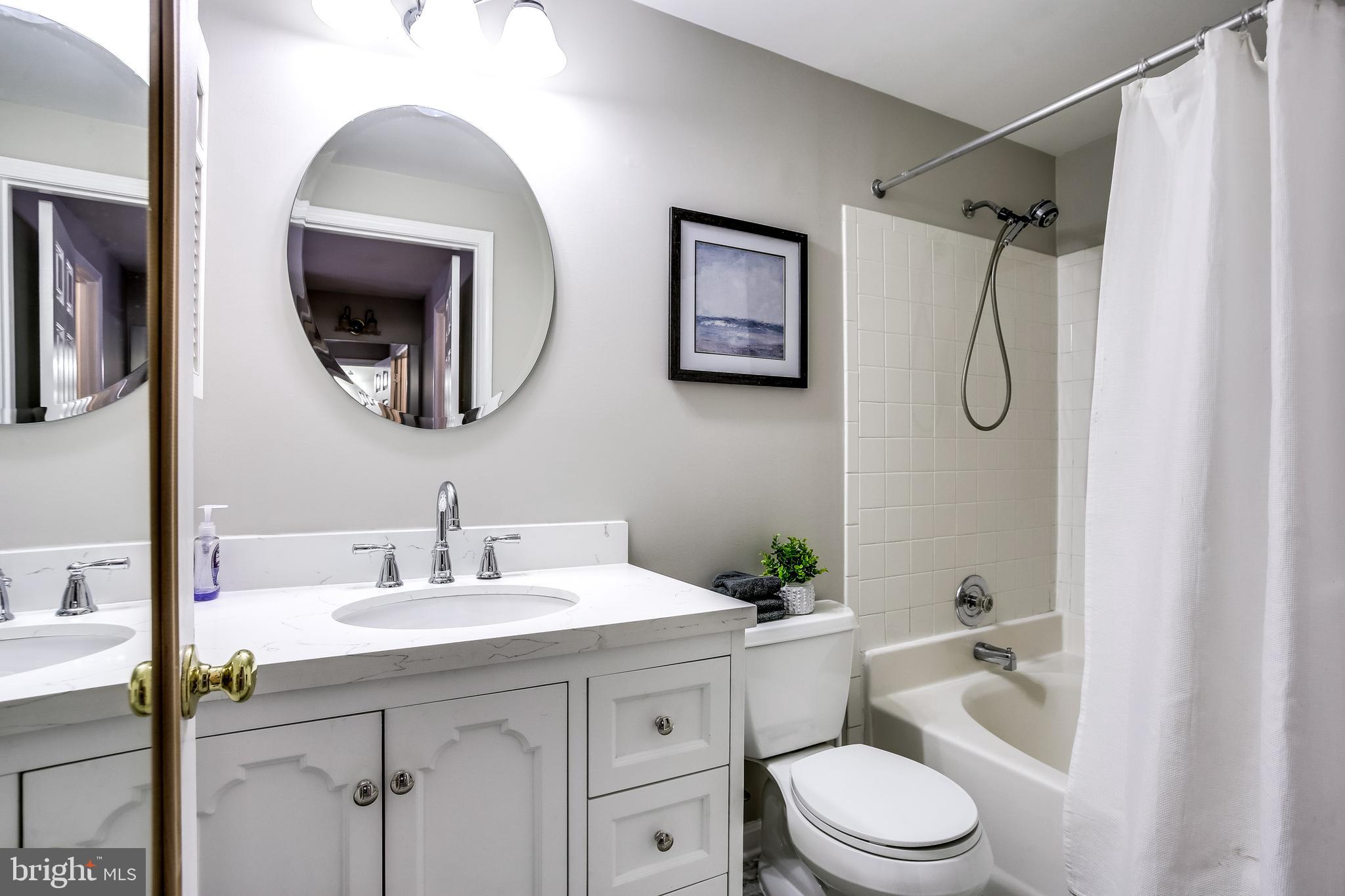14212 Twig Road Silver Spring, MD 20905 - Photo 20 of 36 Primary Bath w/ New Vanity & Floor, Tub/Shower