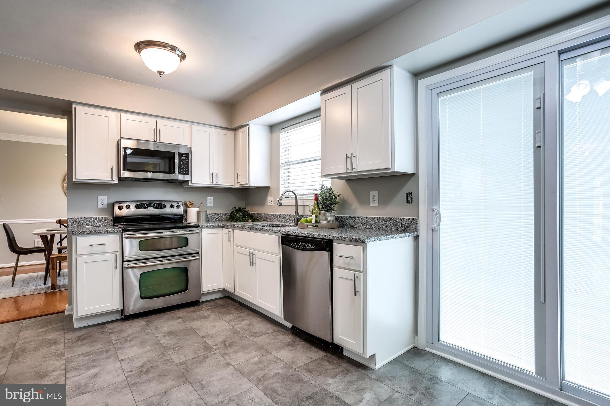 14212 Twig Road Silver Spring, MD 20905 - Photo 8 of 36 Fully Renovated Kitchen w/ SS Appliances