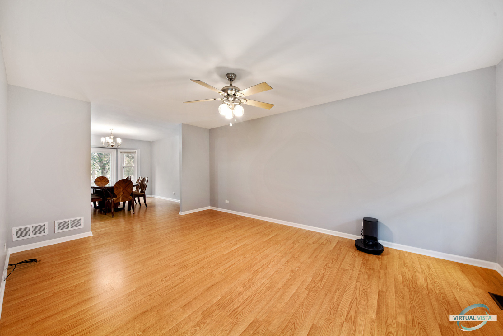 960 Millwood Drive Bartlett, IL 60103 - Photo 16 of 33 a view of dining room with furniture and a chandelier
