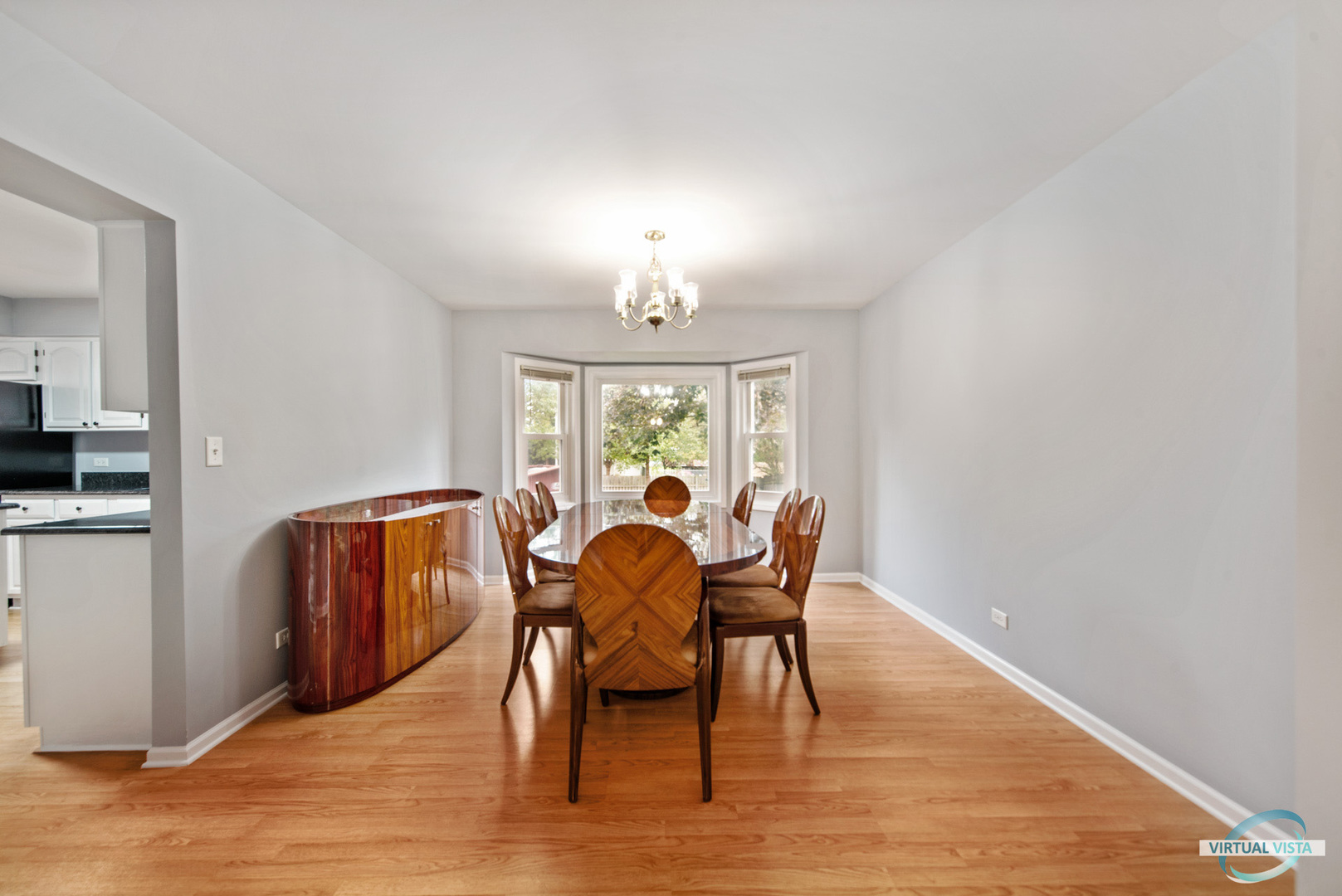 960 Millwood Drive Bartlett, IL 60103 - Photo 18 of 33 a view of a dining room with furniture window and wooden floor