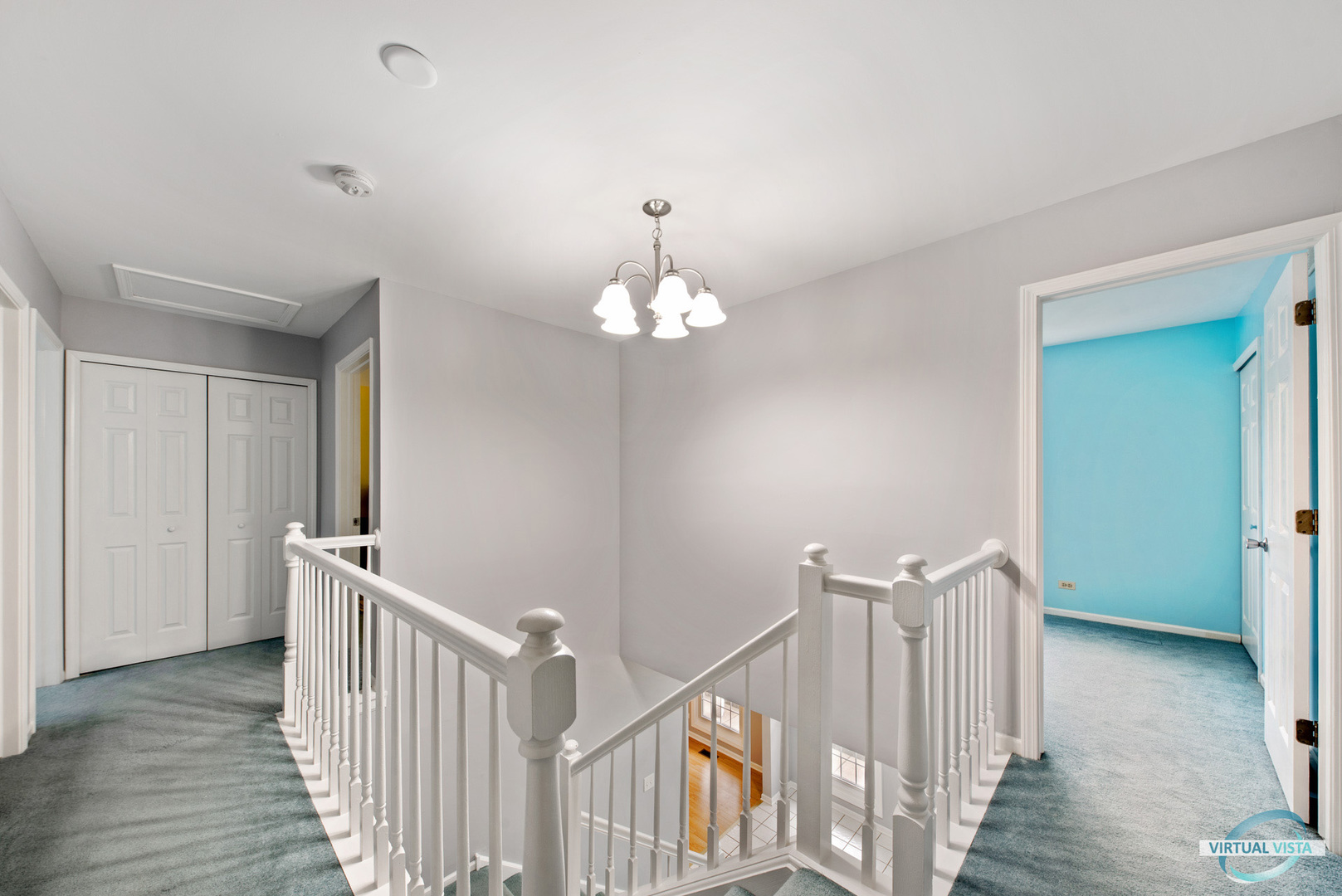 960 Millwood Drive Bartlett, IL 60103 - Photo 25 of 33 a view of a hallway with wooden floor and staircase