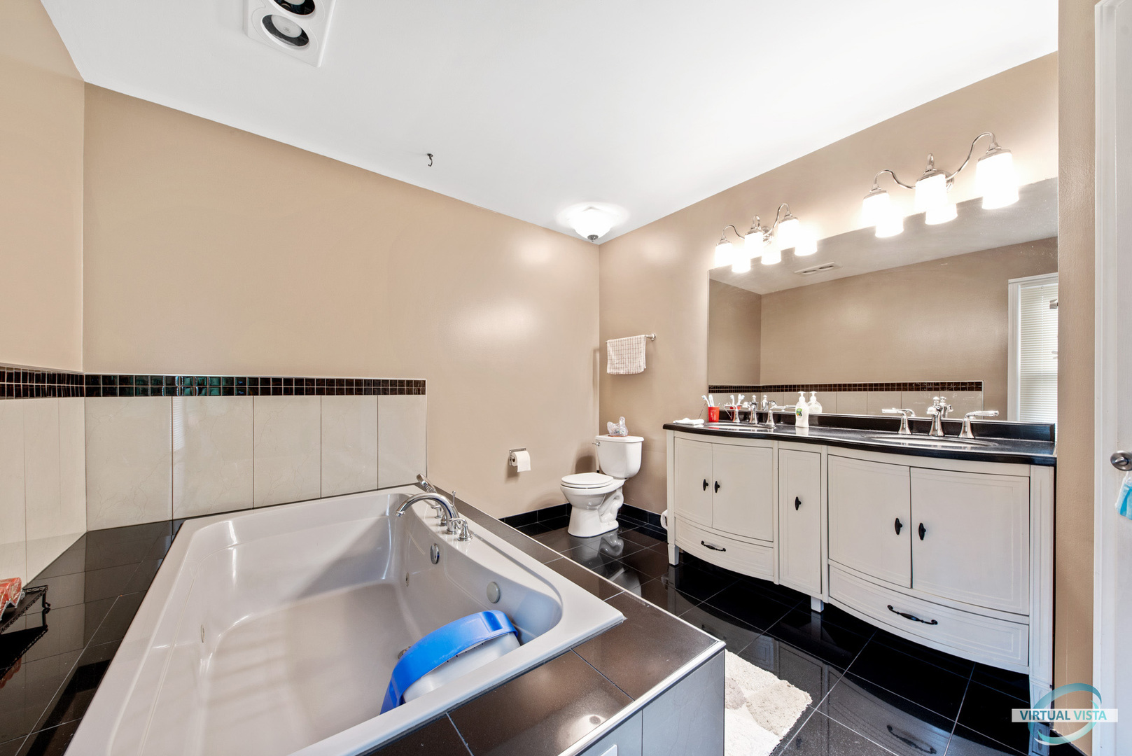 960 Millwood Drive Bartlett, IL 60103 - Photo 28 of 33 a large white kitchen with a large window