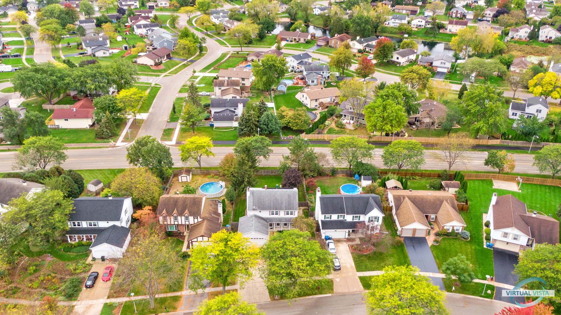960 Millwood Drive Bartlett, IL 60103 - Photo 4 of 33 a balcony with outdoor seating and lots of trees
