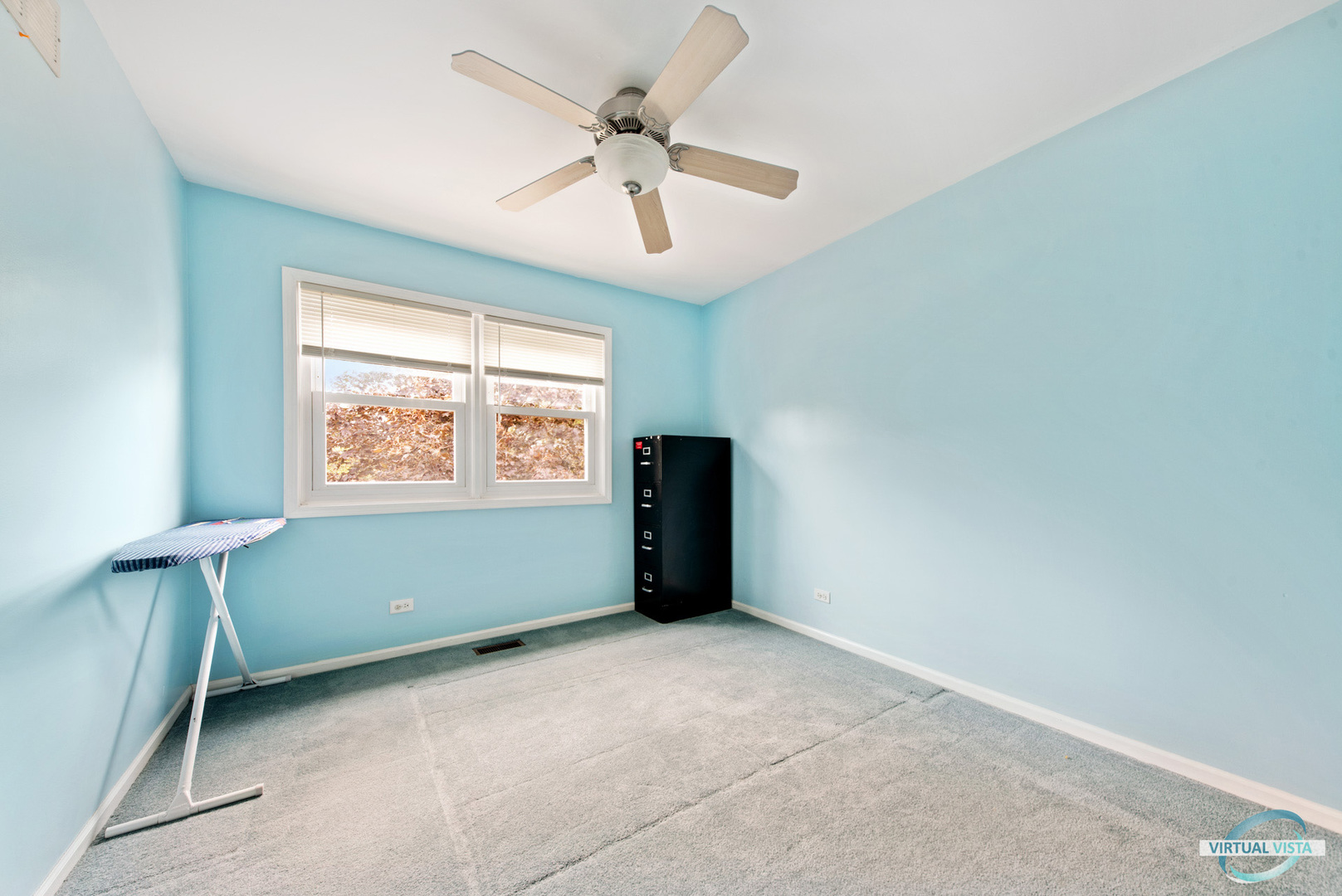 960 Millwood Drive Bartlett, IL 60103 - Photo 31 of 33 an empty room with windows and fan